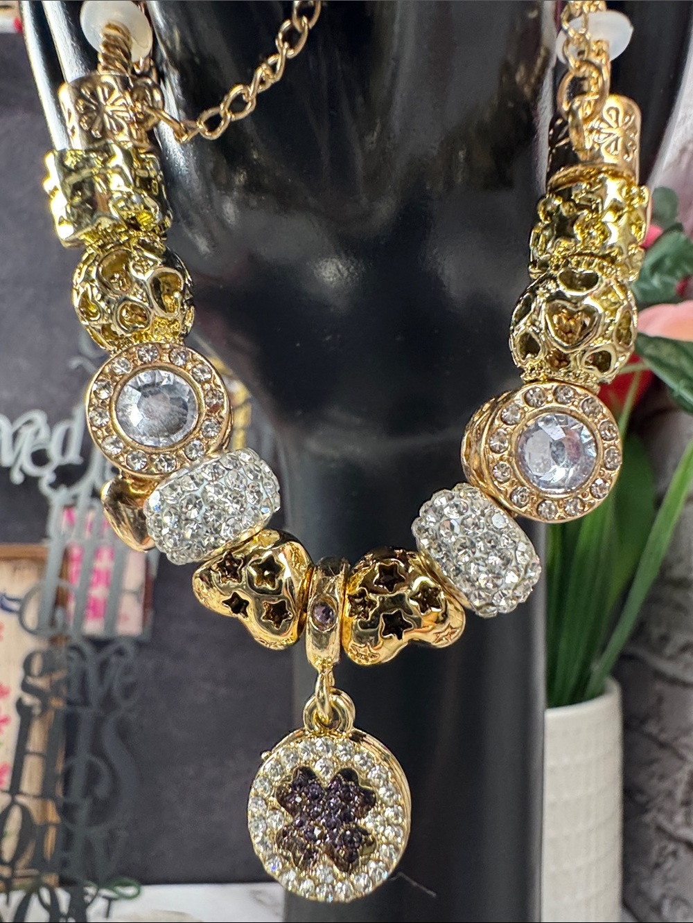 Gold Crystal Charm Bracelet with Purple Accent